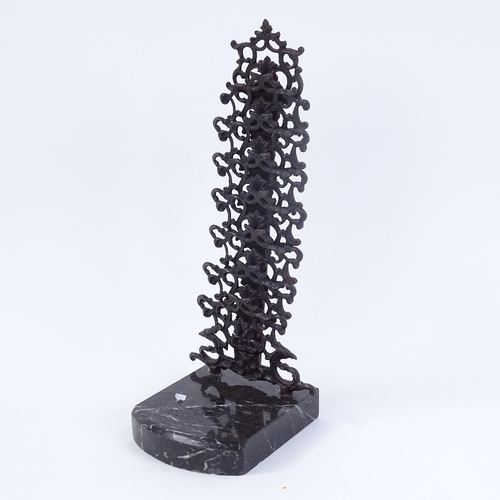 252 - A wrought-iron 7-section tiered letter rack on veined black marble plinth, marked Hanau, overall hei... 