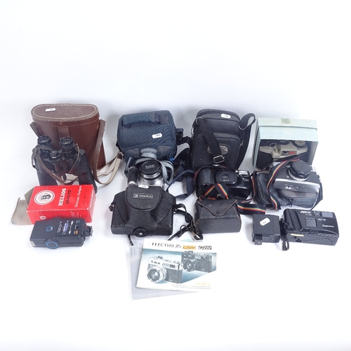 284 - Various cameras and binoculars, including Yashica, Telstar, etc