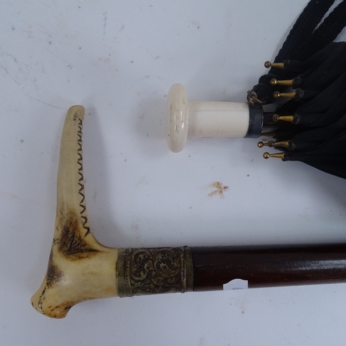 292 - A Paragon ivory-handled parasol, and a stag horn-handled walking stick (2)