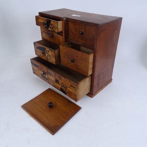 299 - A pair of carved wood Medieval style photograph frames, and a marquetry inlaid table top collector's... 