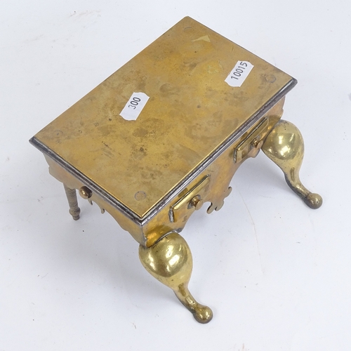 300 - A Victorian brass ink stand, and a Georgian brass miniature footman, footman length 16cm (2)