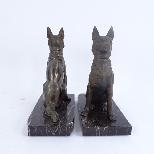 313 - A pair of Art Deco pewter Alsatian dog bookends, on veined black marble plinths, overall height 18cm