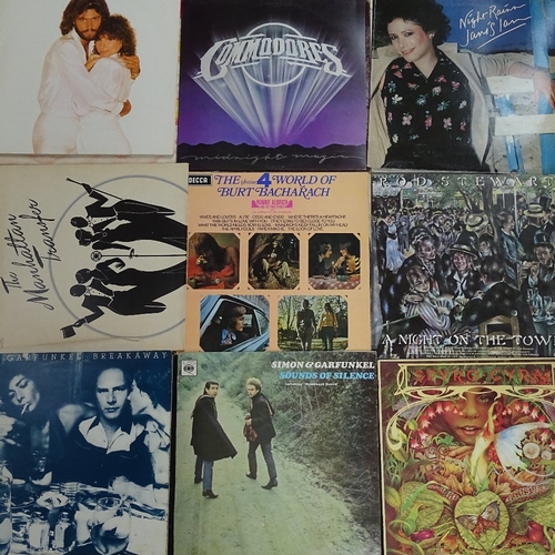 325 - Various Vintage vinyl records and LPs, including Commodores, Stevie Wonder, and Steely Dan