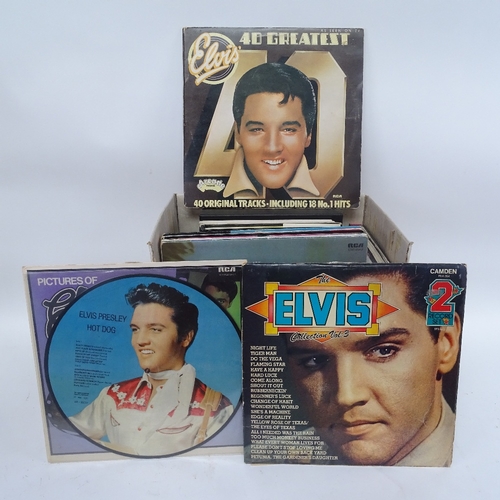 339 - A collection of Elvis vinyl LPs, records and books