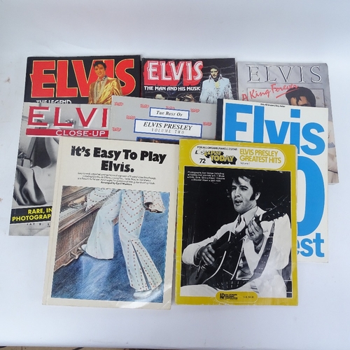 339 - A collection of Elvis vinyl LPs, records and books