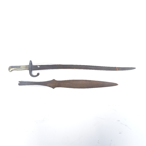 353 - A French First War Period sword bayonet, and a Tribal spear head, bayonet blade length 57cm (2)