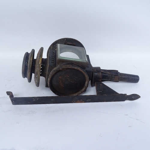 354 - A black painted cast-iron carriage oil lamp with wall mounting bracket, lamp height 51cm