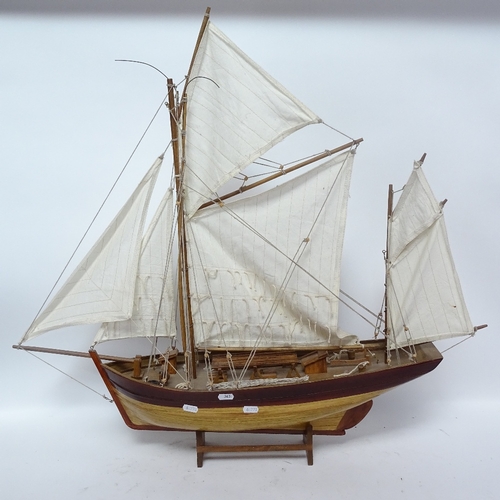 363 - A scratch-built wooden hull model boat, with sails and rigging, overall height 80cm