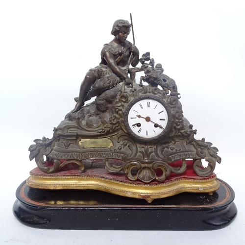 366 - A French 19th century cast-brass 8-day mantel clock, surmounted by figure with kidd, on ebonised bas... 