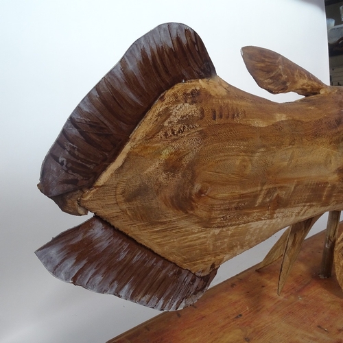 373 - Clive Fredriksson, large carved wood sculpture, Coelacanth on plinth, length 120cm