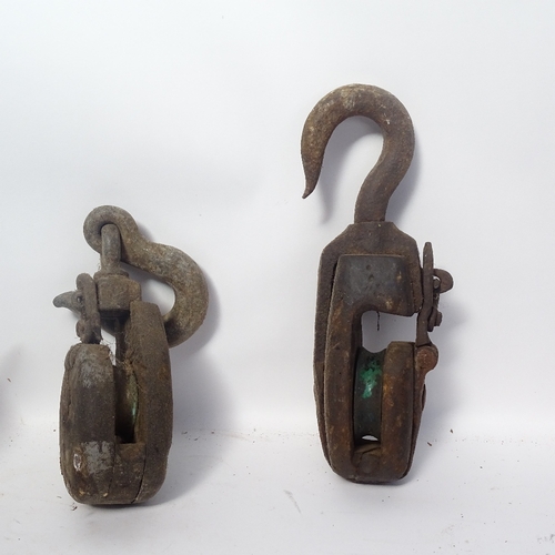 380 - A collection of ships' anchors, pulleys and chisels