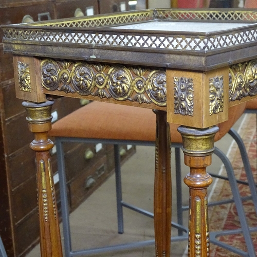 1540 - A French walnut jardiniere stand, with pierced brass gallery, marble top, on fluted legs and ormolu ... 