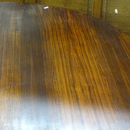 1541 - A mid-century circular teak dining table, on hairpin legs, W137cm , H73cm