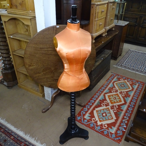 1543 - A Victorian Siegel & Stockman mannequin, recovered in orange silk, on an ebonised telescopic stand, ... 