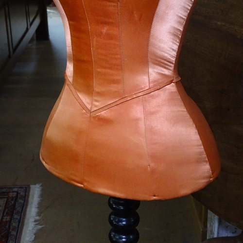 1543 - A Victorian Siegel & Stockman mannequin, recovered in orange silk, on an ebonised telescopic stand, ... 