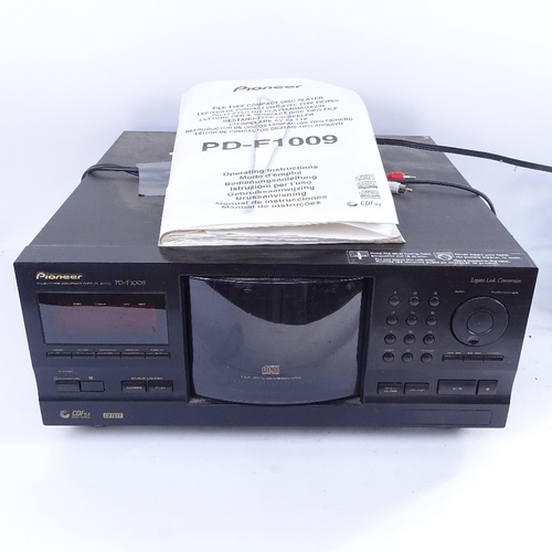 388 - A Pioneer PD-F1009 File-type compact disc player, and a Skytronic Mini AV digital surround amplifier... 