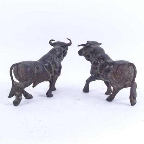 391 - A pair of late 20th century bronze bull sculptures, length 22cm (2)