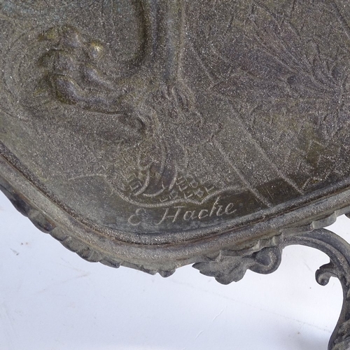 399 - A large cast-brass heraldic lion 2-handled table centre tray, central relief moulded panel with pier... 