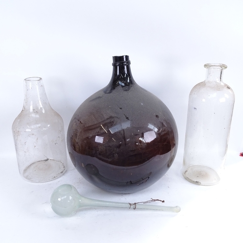 401 - A large cinnamon brown Chemist's carboy glass transporting jar, 2 other large glass storage containe... 