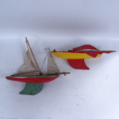 405 - 2 painted wood pond yachts, with collapsible masts, hull length 35cm (2)