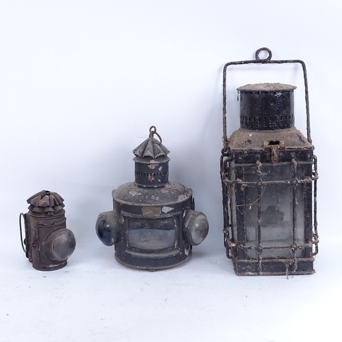 411 - 3 19th century painted metal bulkhead carriage oil lanterns, largest height 38cm (3)