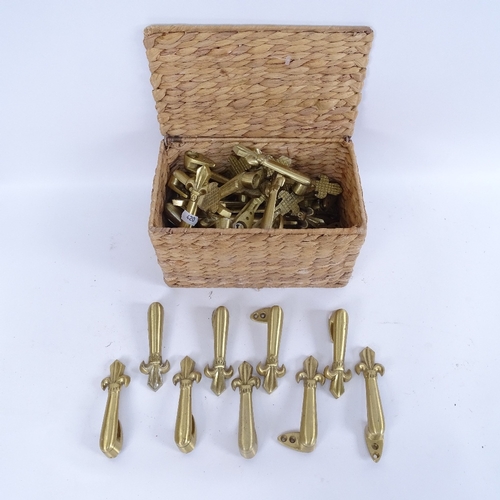 420 - Various brass fireside items, including andirons, fleurs de lis fittings etc