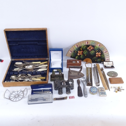 422 - Various silver plated cutlery, a Murano paperweight, fountain pens, binoculars etc