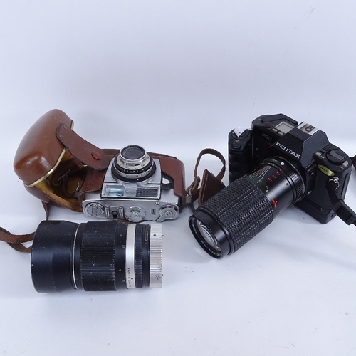 426 - A large collection of various cameras and accessories, including Pentax, Minolta, Kodak etc