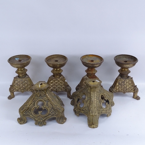 427 - A set of 4 Antique cast-brass candle stands, with lion paw feet, and a pair of cast-brass lamp bases... 