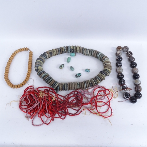 438 - Various hardstone bead necklaces, including large polished banded agate prayer string, and a large p... 