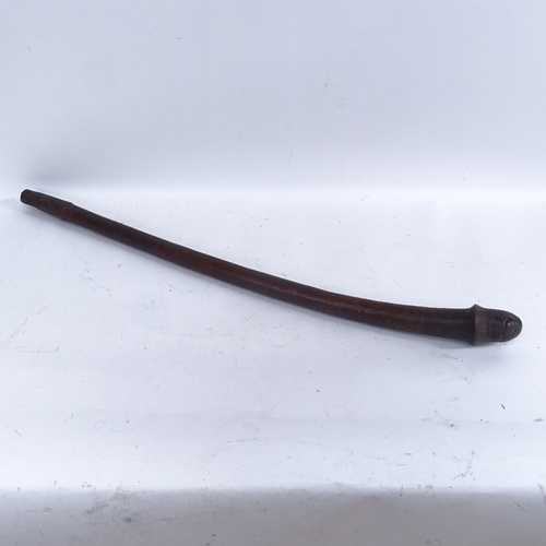 439 - An African Tribal carved hardwood phallus fertility stick, length 83cm