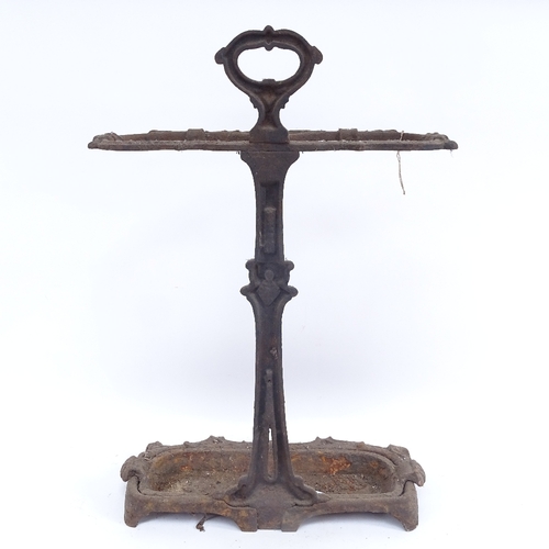 441 - A Victorian painted cast-iron stick stand, with removable drip tray, height 70cm