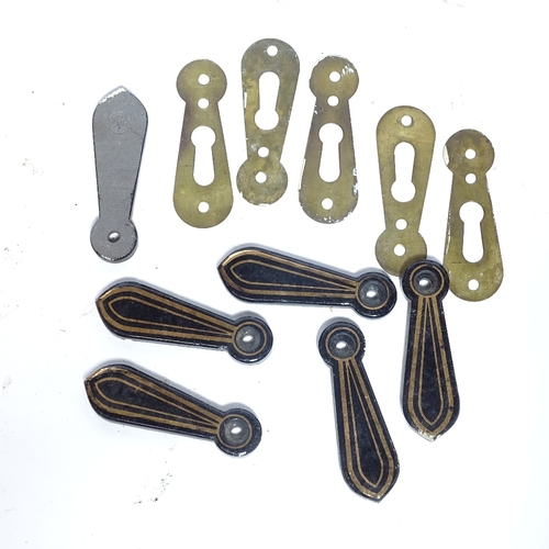 459 - A collection of various cast-metal fittings and brackets, including butcher's hooks