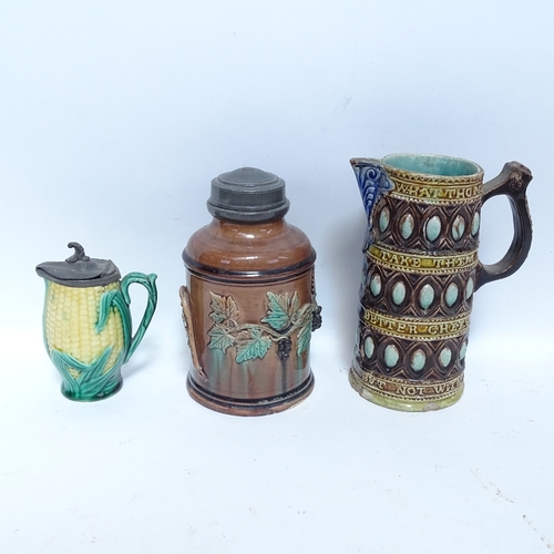 464 - A collection of Majolica ceramic jugs and plates, including corn on the cob and leaf plates