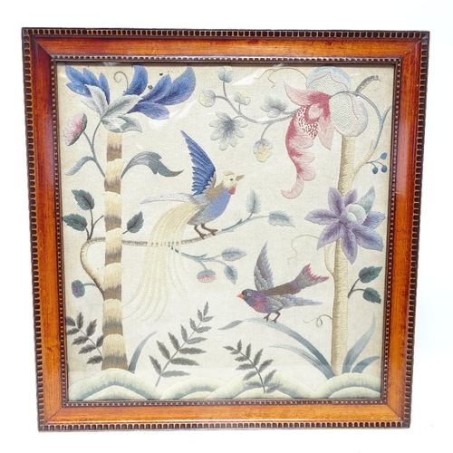 469 - An Oriental woolwork embroidery, depicting birds of paradise and nature, framed, frame height 65cm