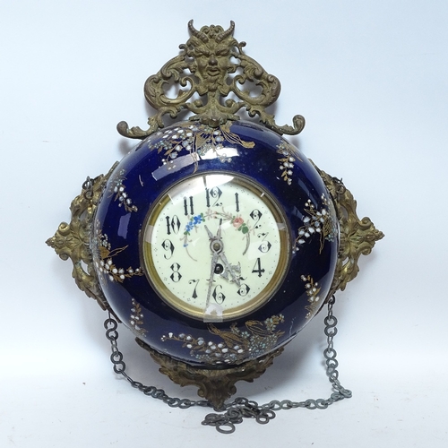 474 - An ornate French brass and ceramic-cased wall hanging clock, with enamel dial and 8-day movement, ca... 