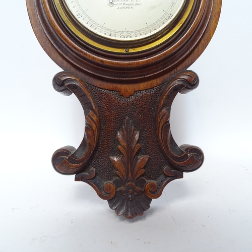 484 - An oak-cased wheel barometer and thermometer, by Newton & Co of London, overall height 68cm