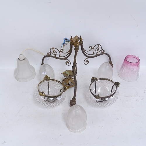 587 - A brass 3-branch chandelier with frosted glass shades, 2 moulded glass ceiling light bowls, and a cr... 