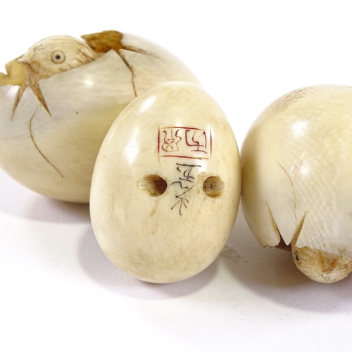 20 - 3 Japanese ivory hatching chicks in egg, smallest is a netsuke with signature to base, largest 5cm l... 