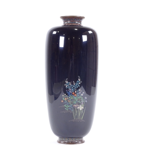 22 - A fine Meiji period Japanese cloisonne baluster vase, dark blue body with Japanese garden decoration... 