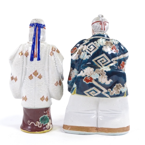 26 - 2 Japanese Meiji period polychrome porcelain figures, of actors wearing noh masks, tallest 23cm.