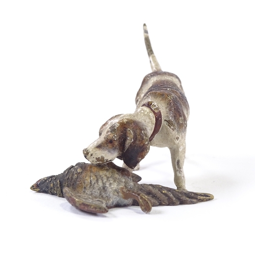 42 - A Vienna cold painted bronze Springer Spaniel with pheasant, length 7cm.