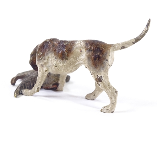 42 - A Vienna cold painted bronze Springer Spaniel with pheasant, length 7cm.