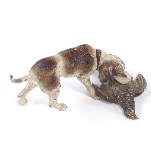 42 - A Vienna cold painted bronze Springer Spaniel with pheasant, length 7cm.