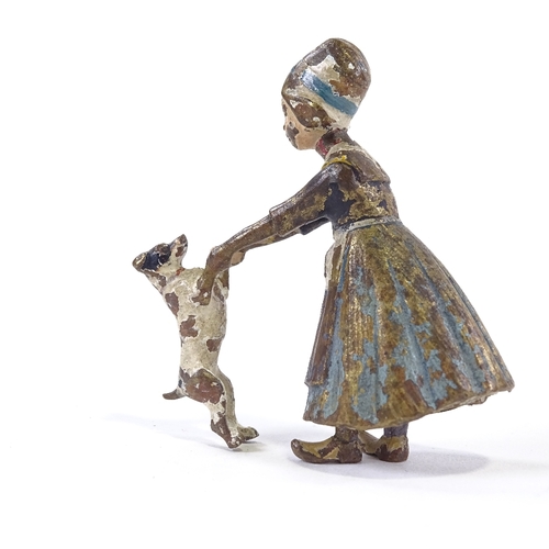45 - A Vienna cold painted bronze dutch girl with dog, height 5cm.