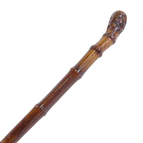 83 - A square section bamboo walking cane, with Solingen steel blade, length 90cm.