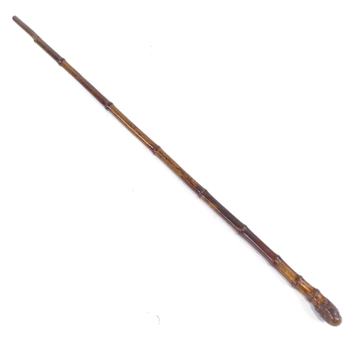 83 - A square section bamboo walking cane, with Solingen steel blade, length 90cm.