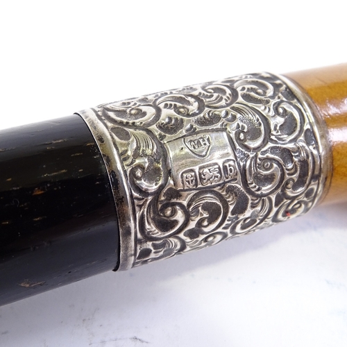 85 - An ebonised briar wood silver collared cane, hallmarked Birmingham 1901, makers mark W.H., length 92... 