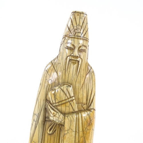 88 - A Chinese carved ivory sage figure, 18th/19th century, height 22cm.