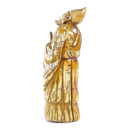 89 - A Chinese carved ivory sage figure, 18th/19th century, height 21cm.